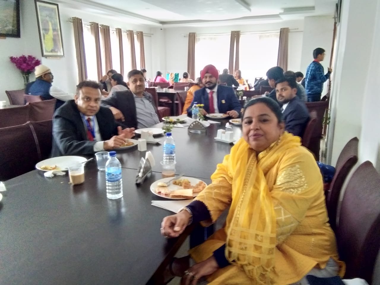Corporate group at a planning meeting around the conference table