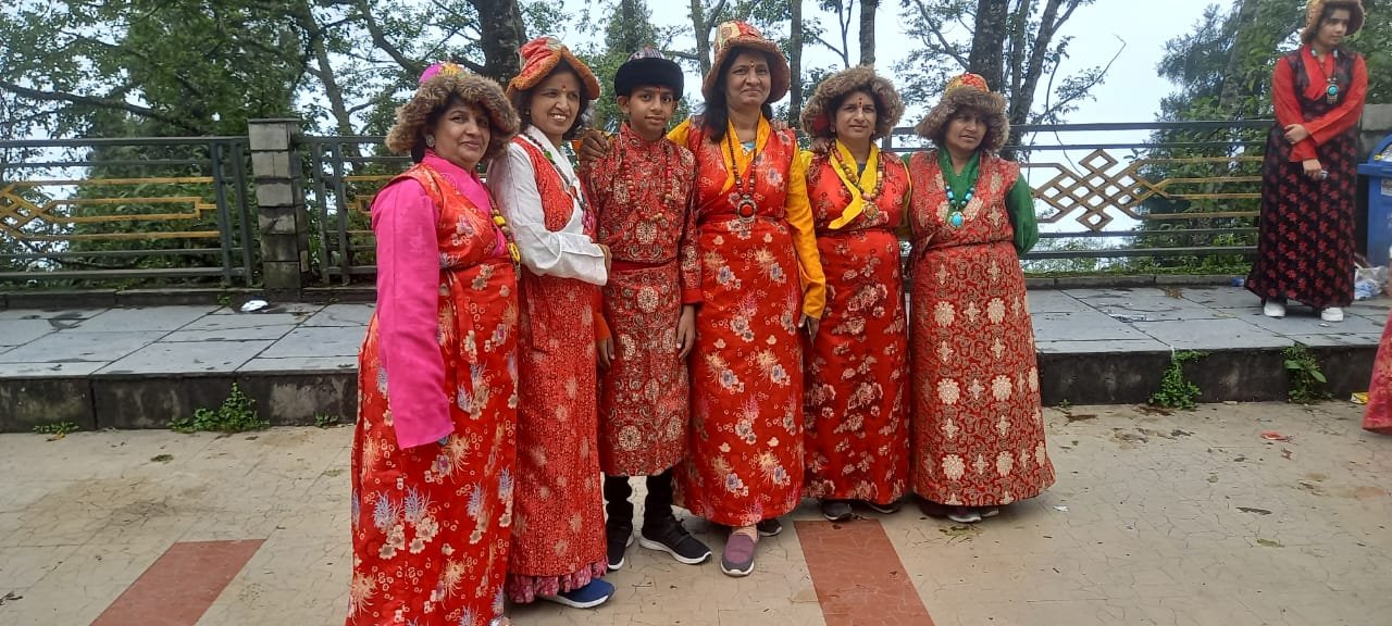 Guests in traditional Bhutia and Lepcha attire at a Sikkim gathering